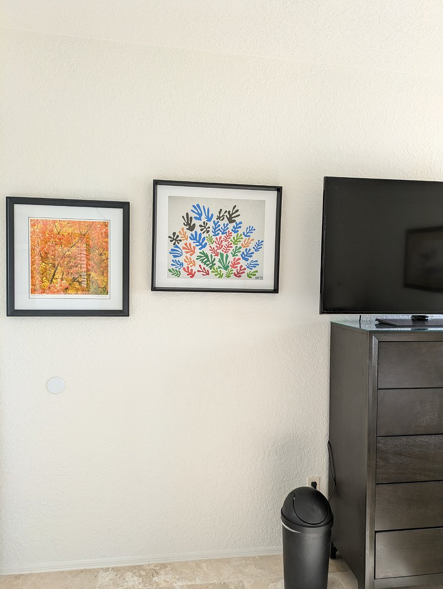 SMALLER BEDROOM $1400/MONTH ART ON WALL