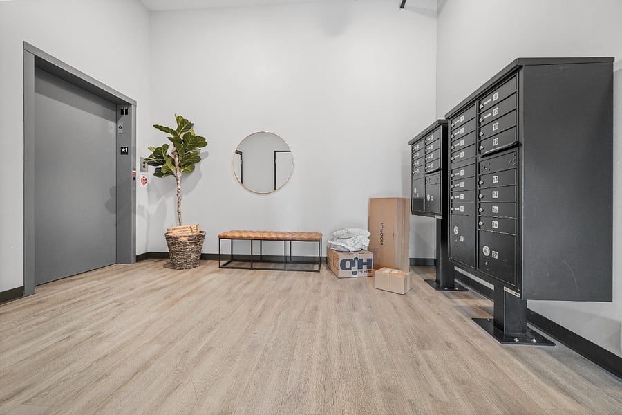 Lobby, elevator, and mail area.