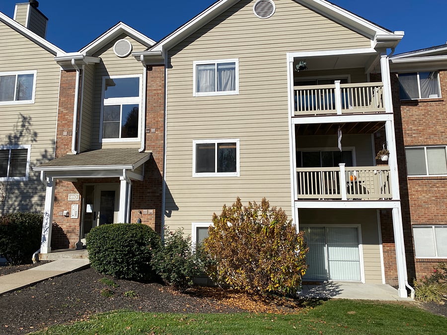 Free parking on premises with one assigned space near entry and ample open guest parking spaces.
