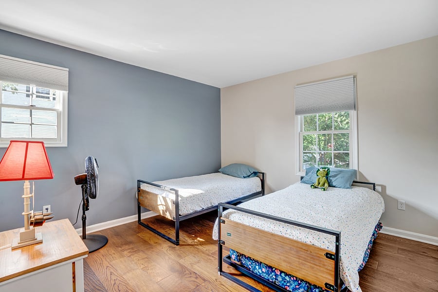 room with three twin beds