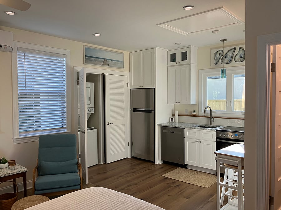 Kitchenette with Stackable Laundry Unit and a separate clothing closet