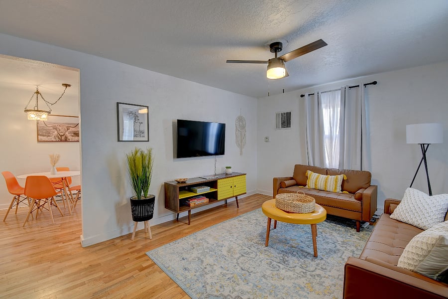 Living room with Smart TV and board games.