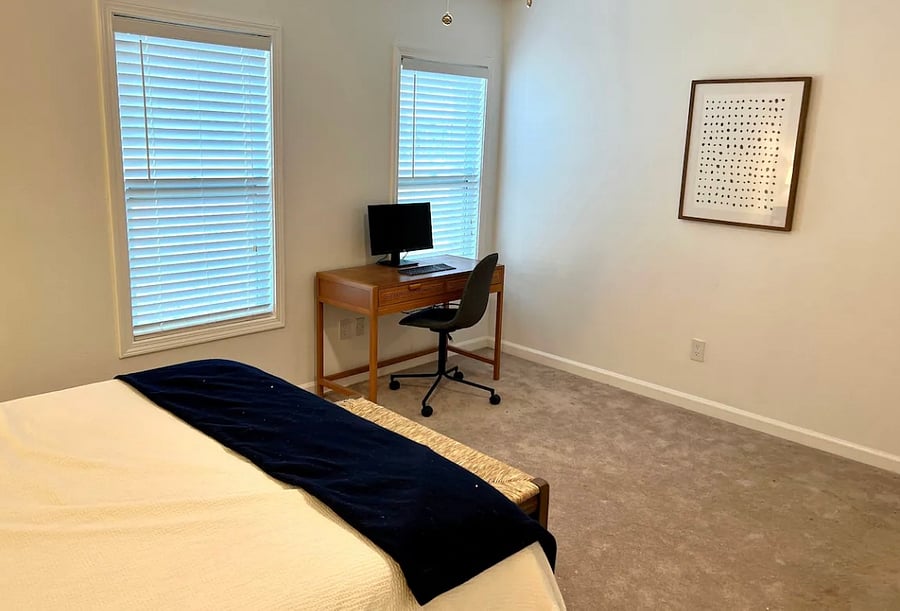 Primary bedroom with desk for working from home