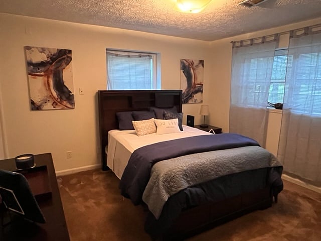 Spacious bedroom, dresser & closet space.
