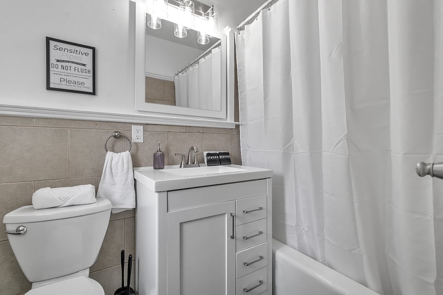 Compact bathroom with tile surround