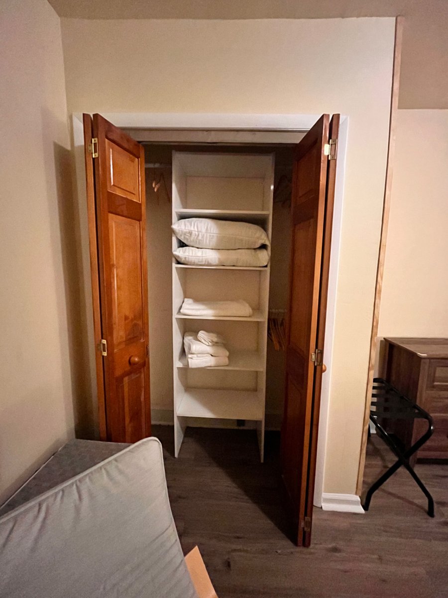 Bedroom 1 closet with extra blankets.