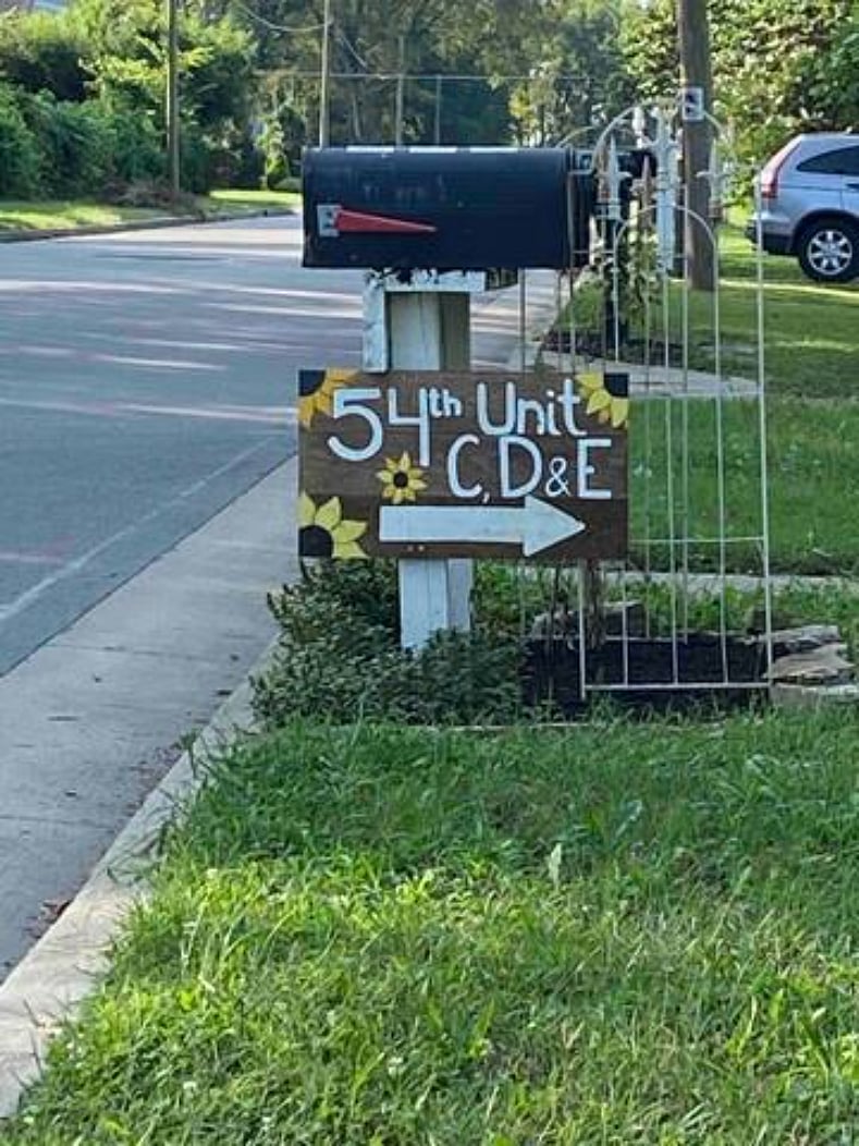 Look for sign, You'll turn into gravel driveway with Brown house in front. Pull down the alley to the Brown storage shed. You'll see the unit on the far left.