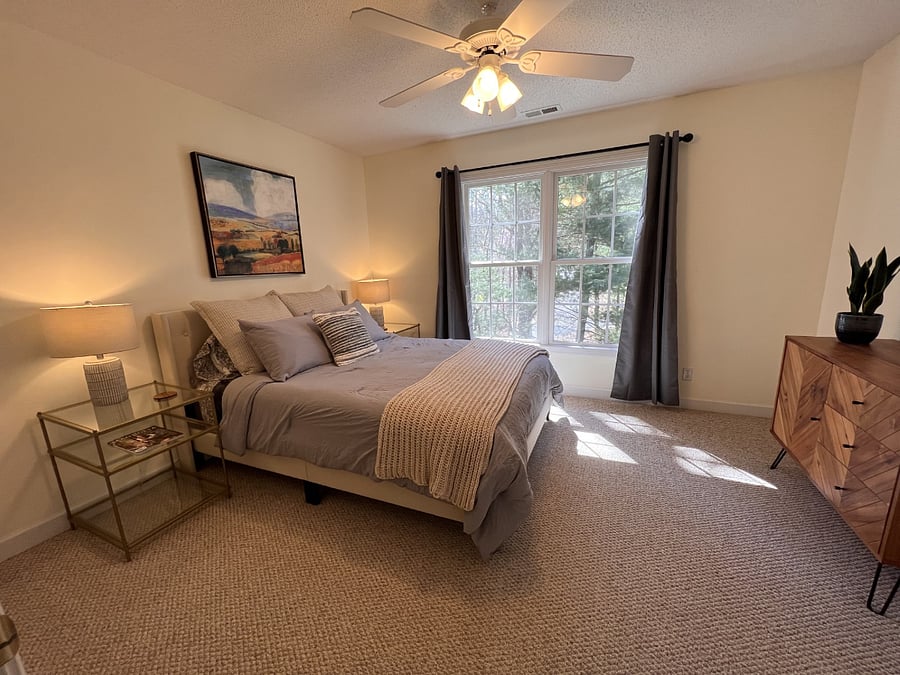 Bedroom #3 with large closet and view of front yard.