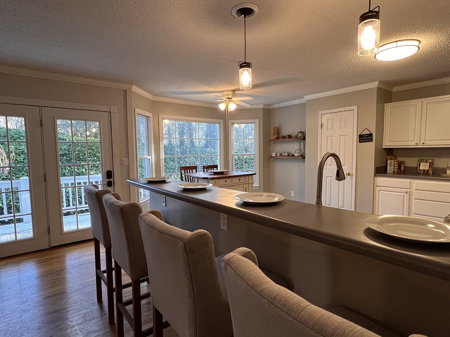 Kitchen bar sits 4.