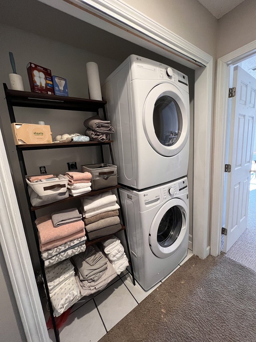 Laundry area is upstairs. Full size washer and dryer with plenty of towels. Opposite is the line closet with plenty of sheets.