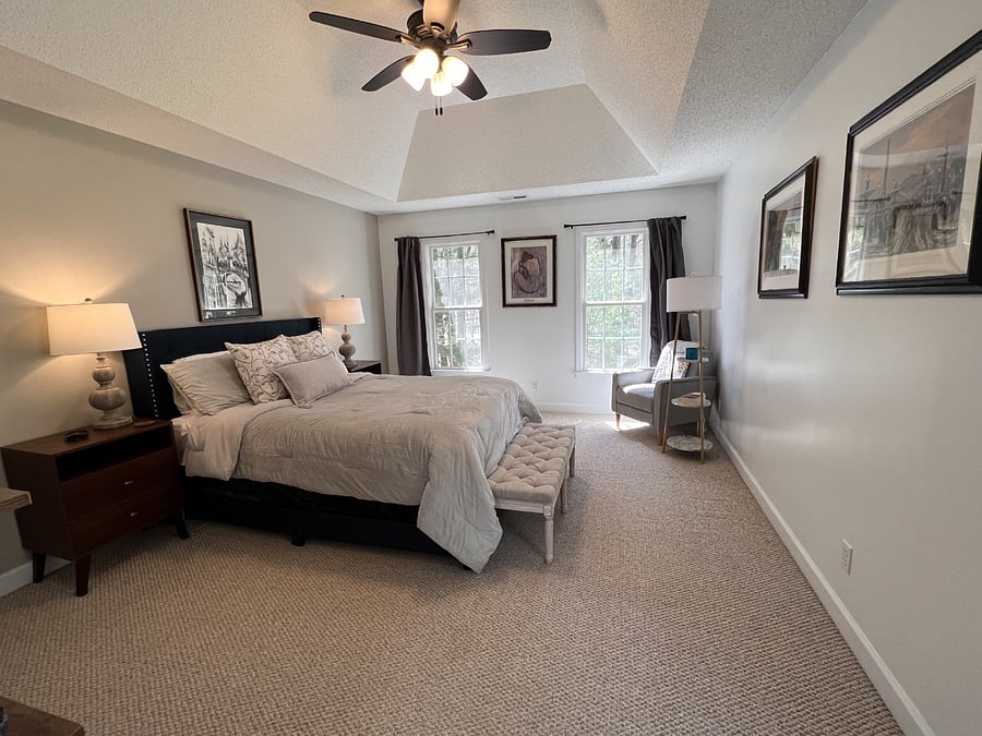 Primary bedroom with queen bed.
