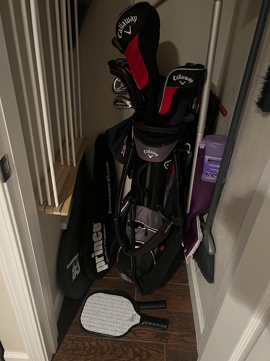 Storage Closet Includes Golf Clubs, Racquets & Balls