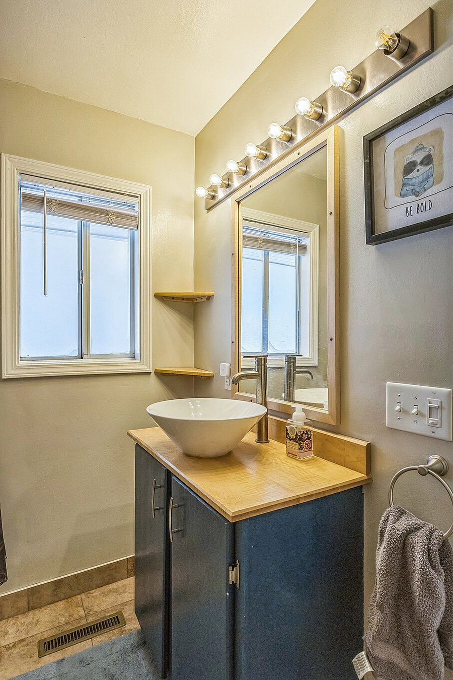 Bathroom for 2 BRs with tub and shower.