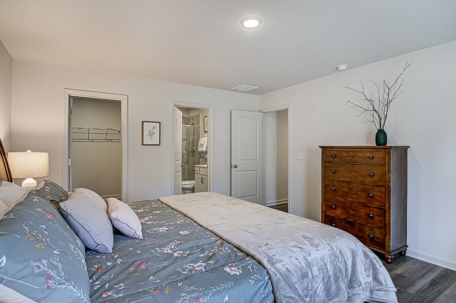 King Bedroom with walk-in wardrobe and en-suite shower room