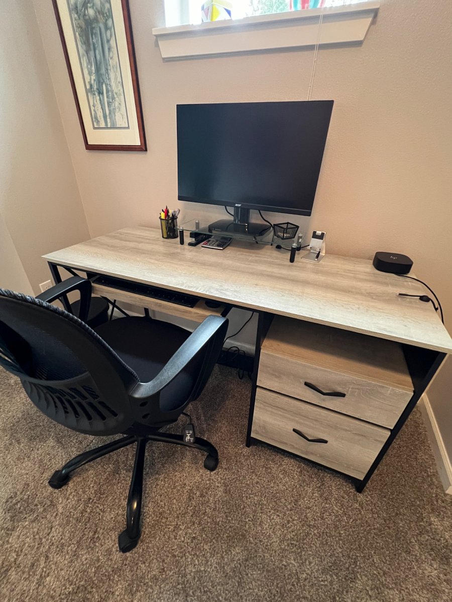 Desk complete with keyboard and mouse and monitor to connect with your laptop.