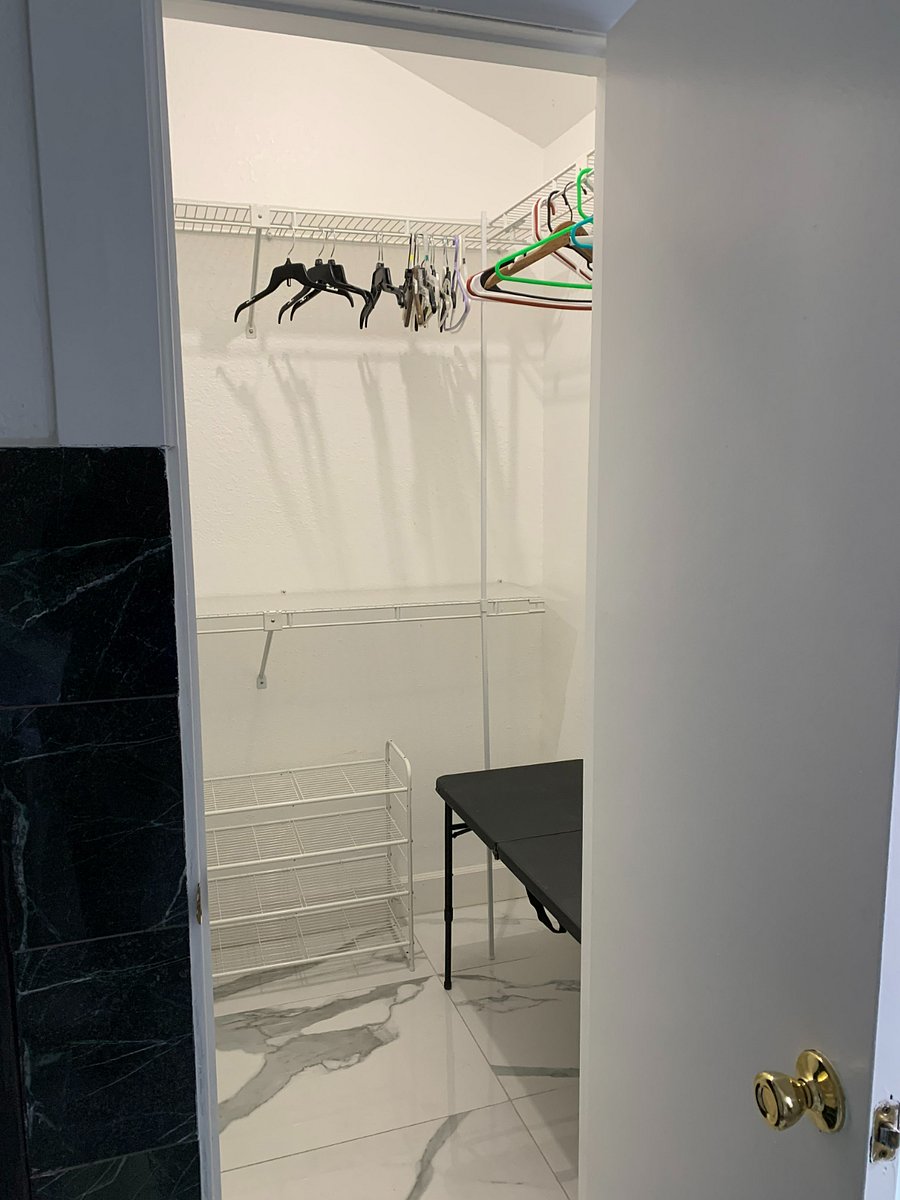 Master walk in, U-shaped closet