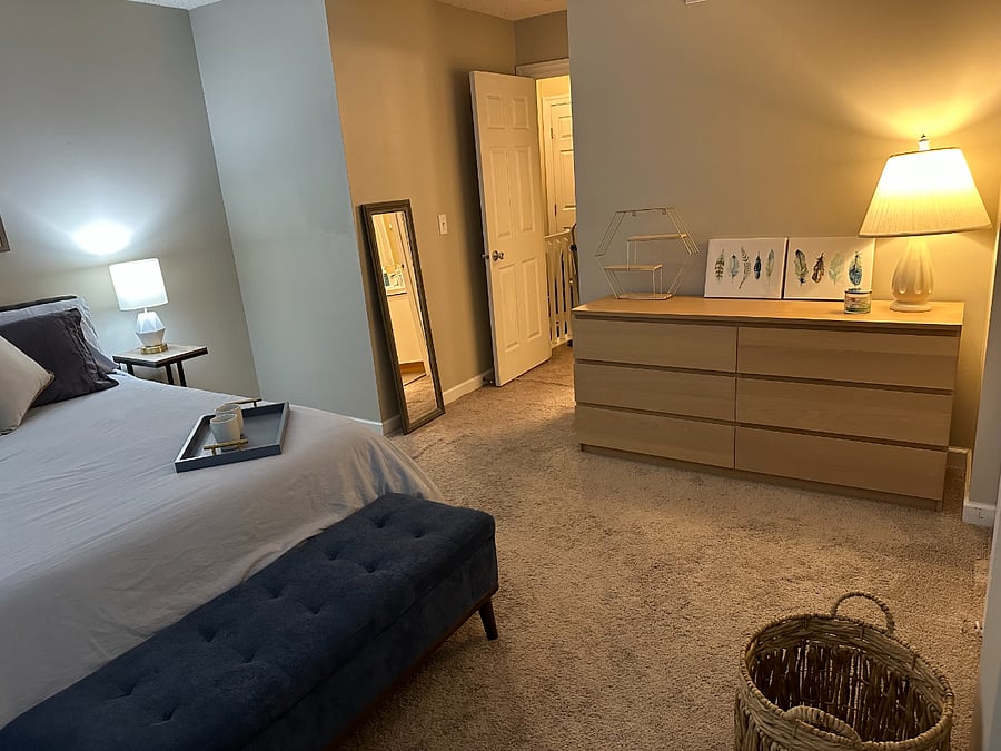Master bath features a shower/tub and is private in master bedroom.