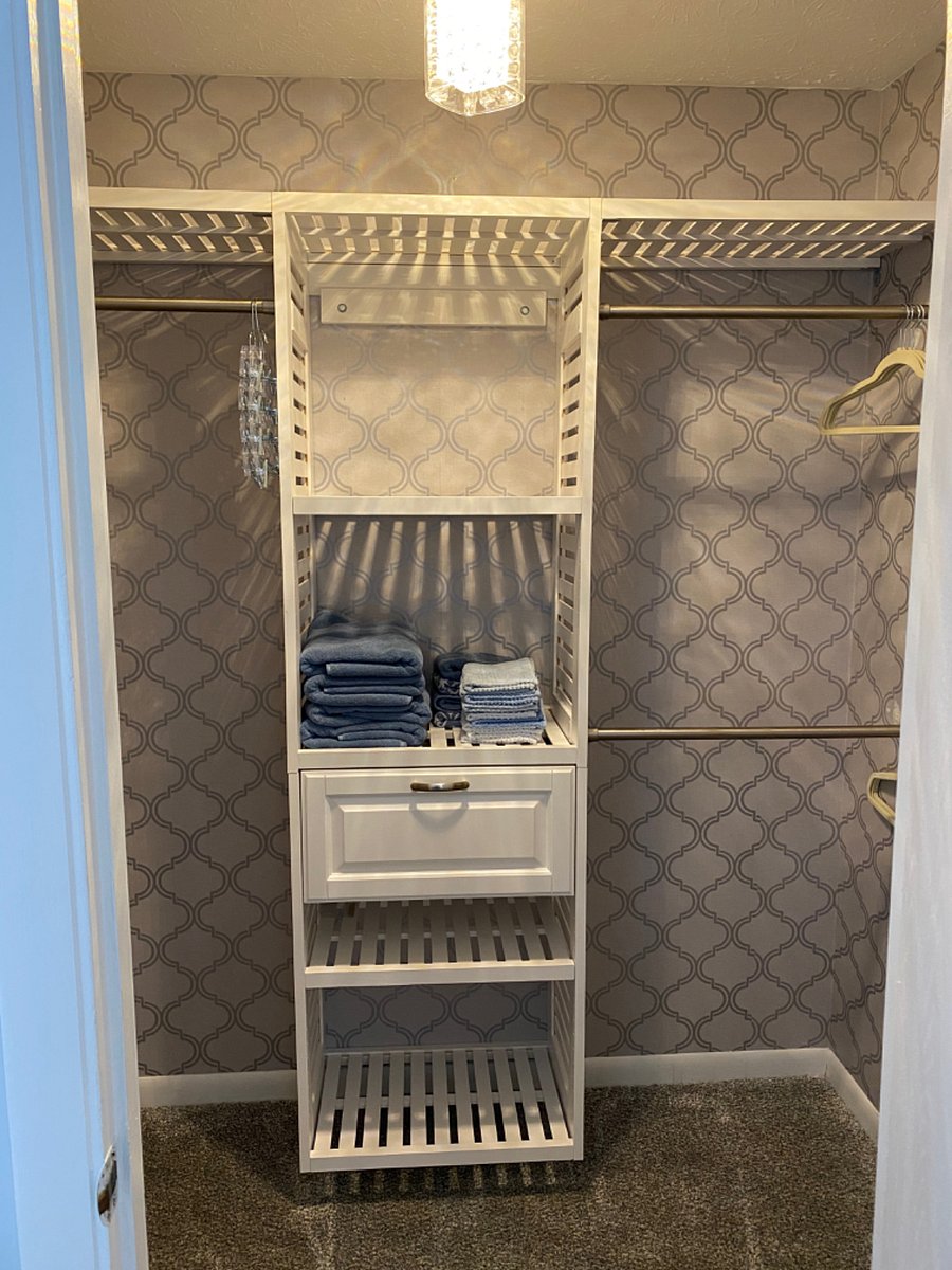 Primary bedroom walk-in closet. It's stunning!