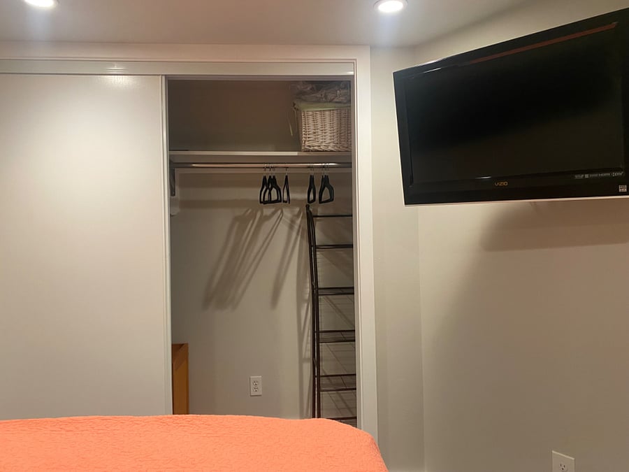 full sized closet in bedroom