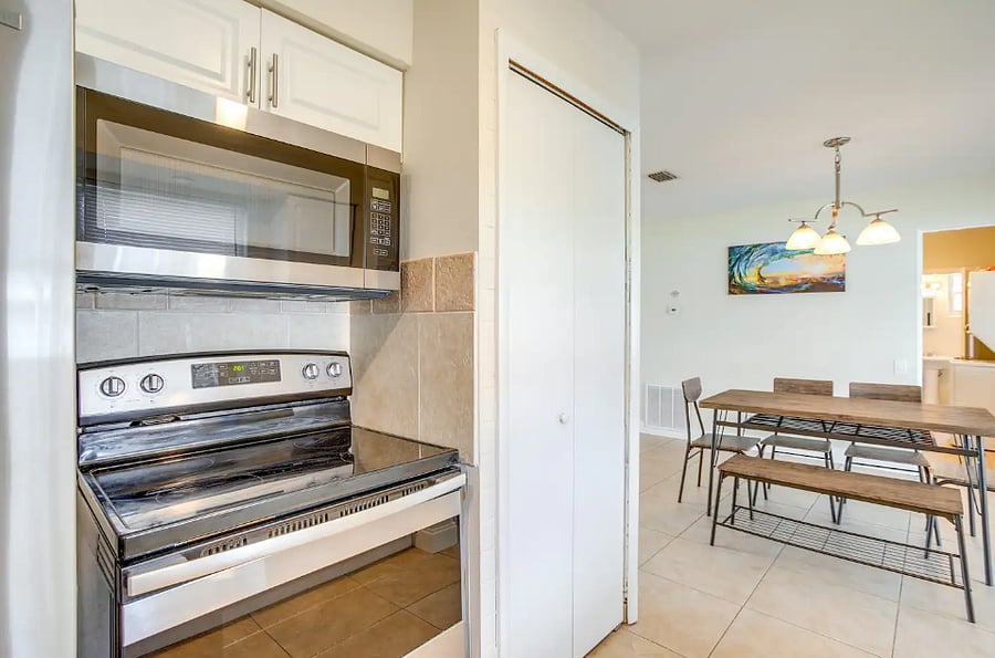 "Coffee maker, cookware, dishes, and kitchen essentials included."
