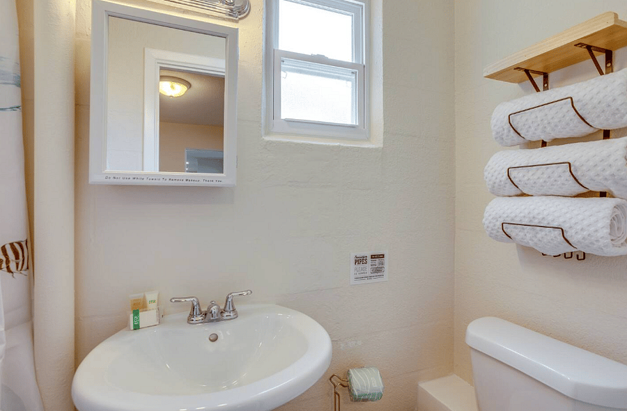 "Updated bathroom with fresh towels and starter toiletries."