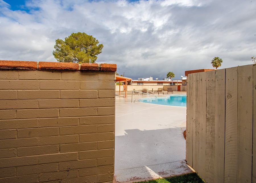 You can see the gate from our patio opens to the pool. Some of my travelers just like to go out there and suntan in the lounger chairs.
