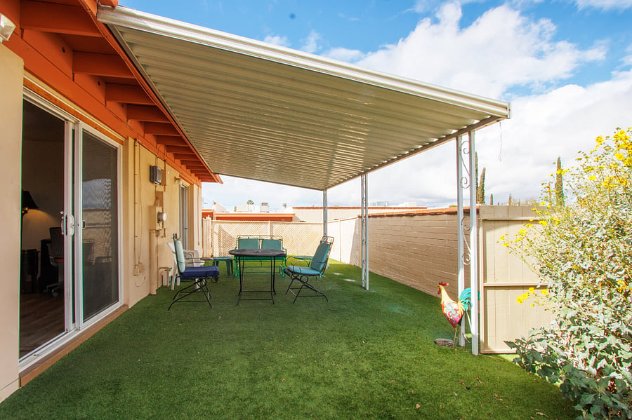 Patio area. Sliding doors in both living room and MBR open to this covered patio.