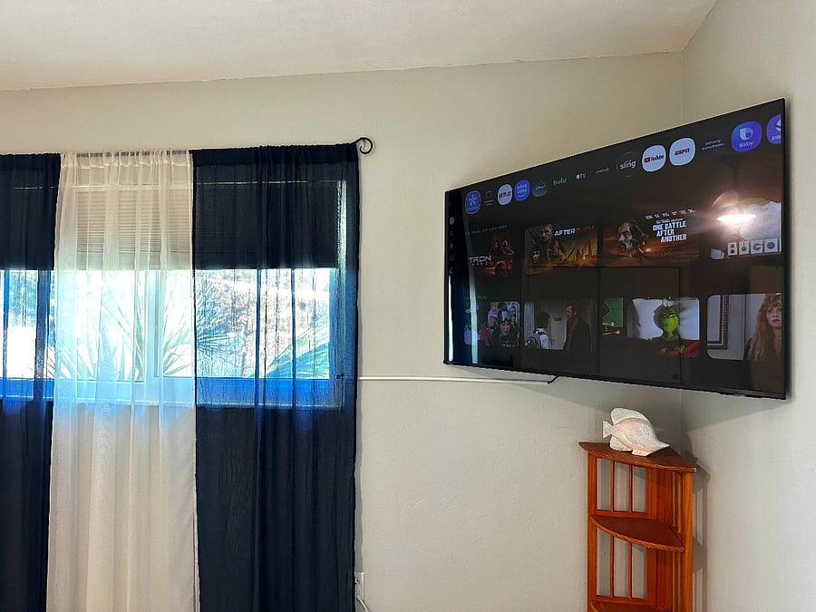 55" TV in primary bedroom