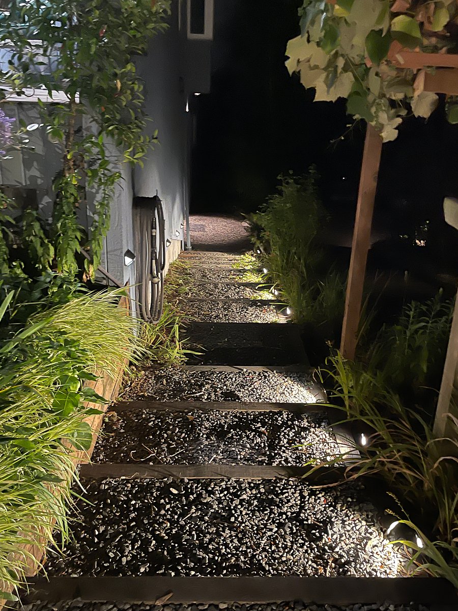 Well lit exterior steps for safe night entry.