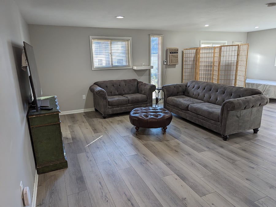 Open spacious living area with comfy furniture