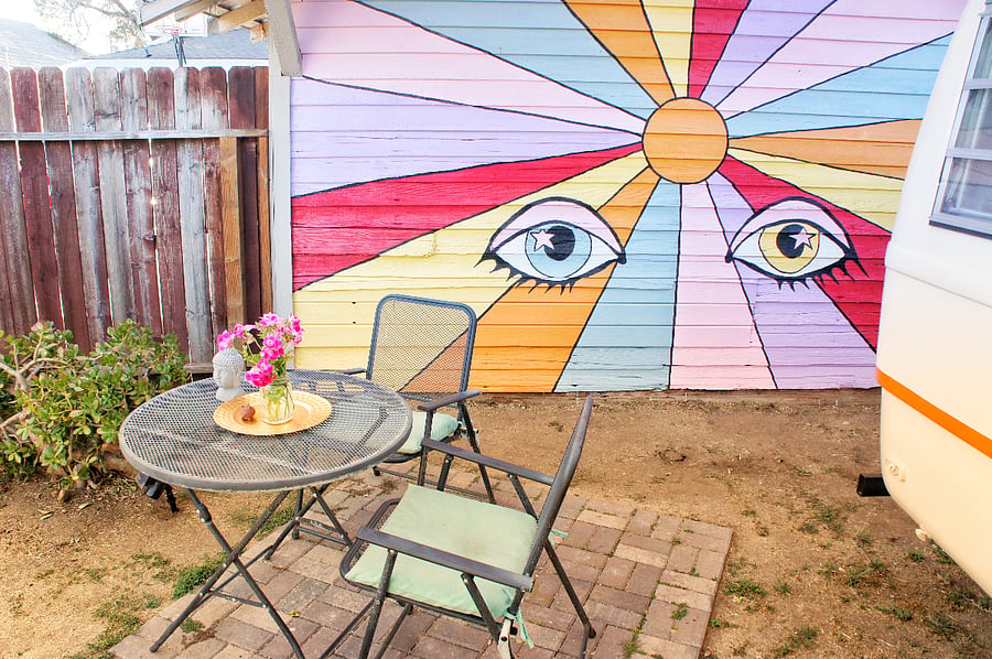 The back garden features many spaces to relax and unwind.