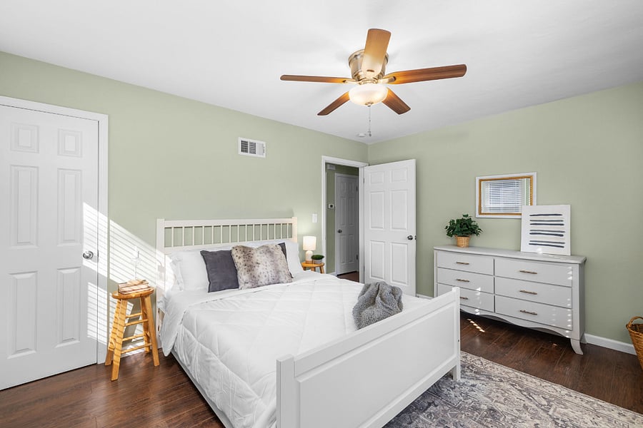 Queen bed in this main bedroom. Lots of natural light in this room if you want it or, close the room darkening blinds to get that much needed rest in the new memory foam bed. 