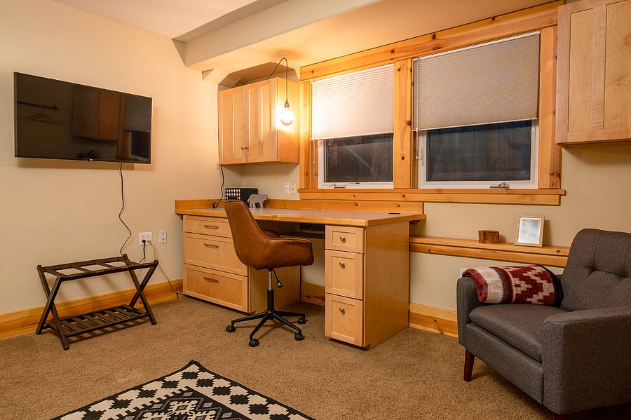Large bedroom with built in desk