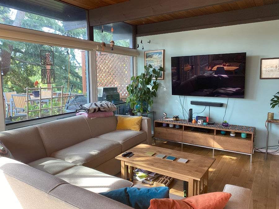 Comfy living room, seating for all, nice new TV, and a fireplace