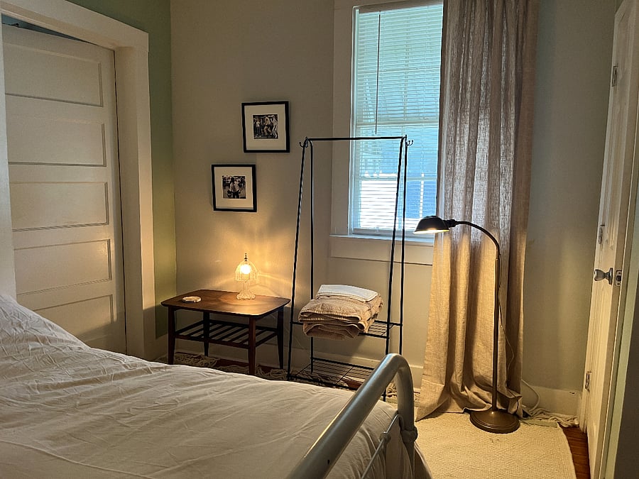 BEDROOM w/ 2 closet space and smart tv.