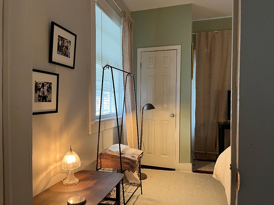 BEDROOM w/ 2 closet space and smart tv.