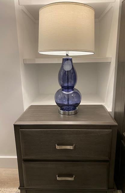 Giant recessed storage shelves in the bedroom.