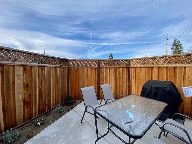 4-person patio set (has an umbrella too) and barbecue.