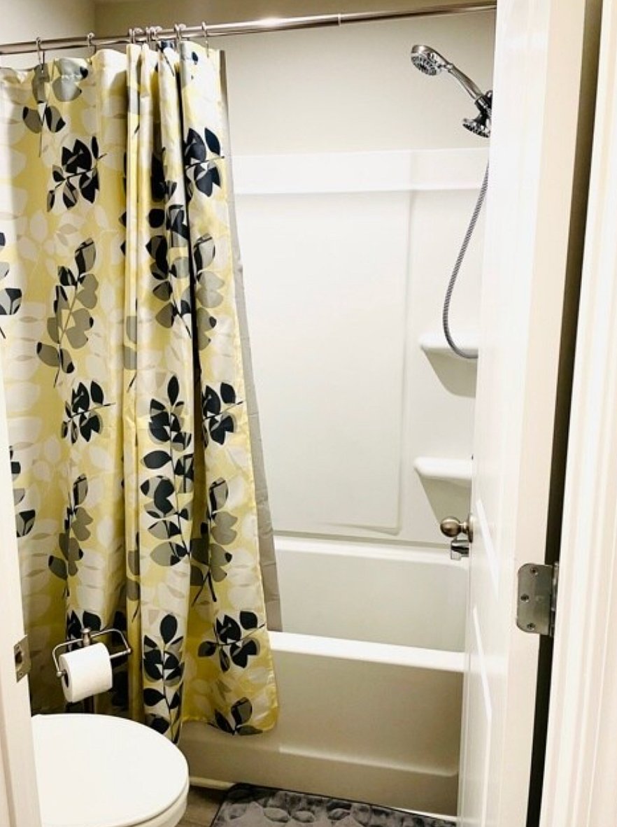 Take a hot, relaxing shower with the removable multi-setting shower head

