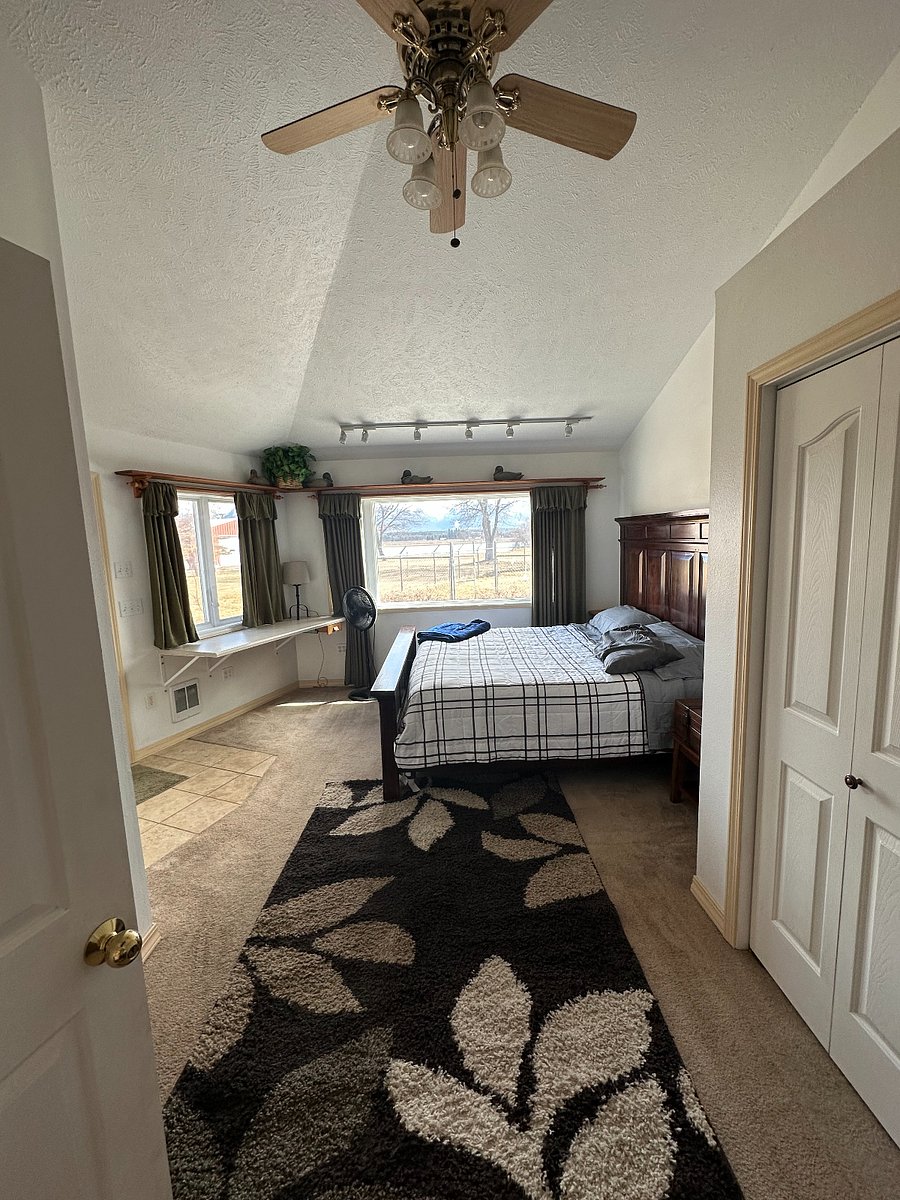 Big bedroom, king sized bed, big windows and exterior door, bathroom is right across the hallway
