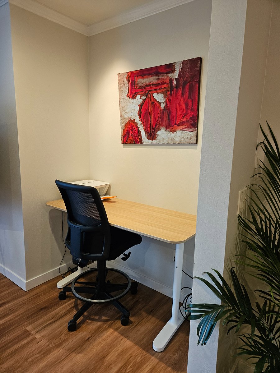 Dedicated workspace with sit/stand desk for remote working
