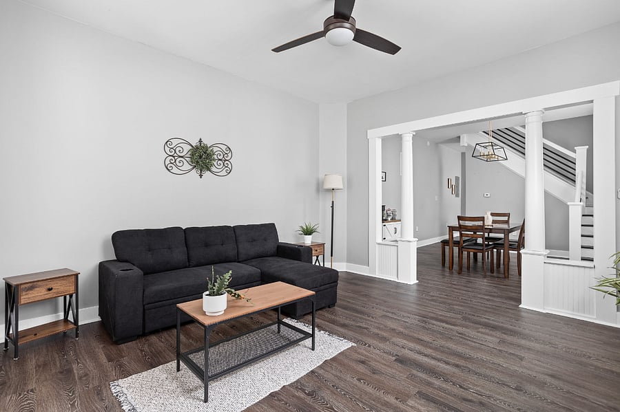 An inviting living room featuring a sleeper couch, perfect for relaxing or accommodating extra guests.