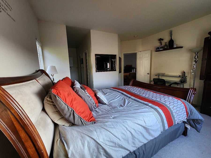 Master Bedroom - Plenty of space in the room; Furnished with a desk. Convenient for business or school work