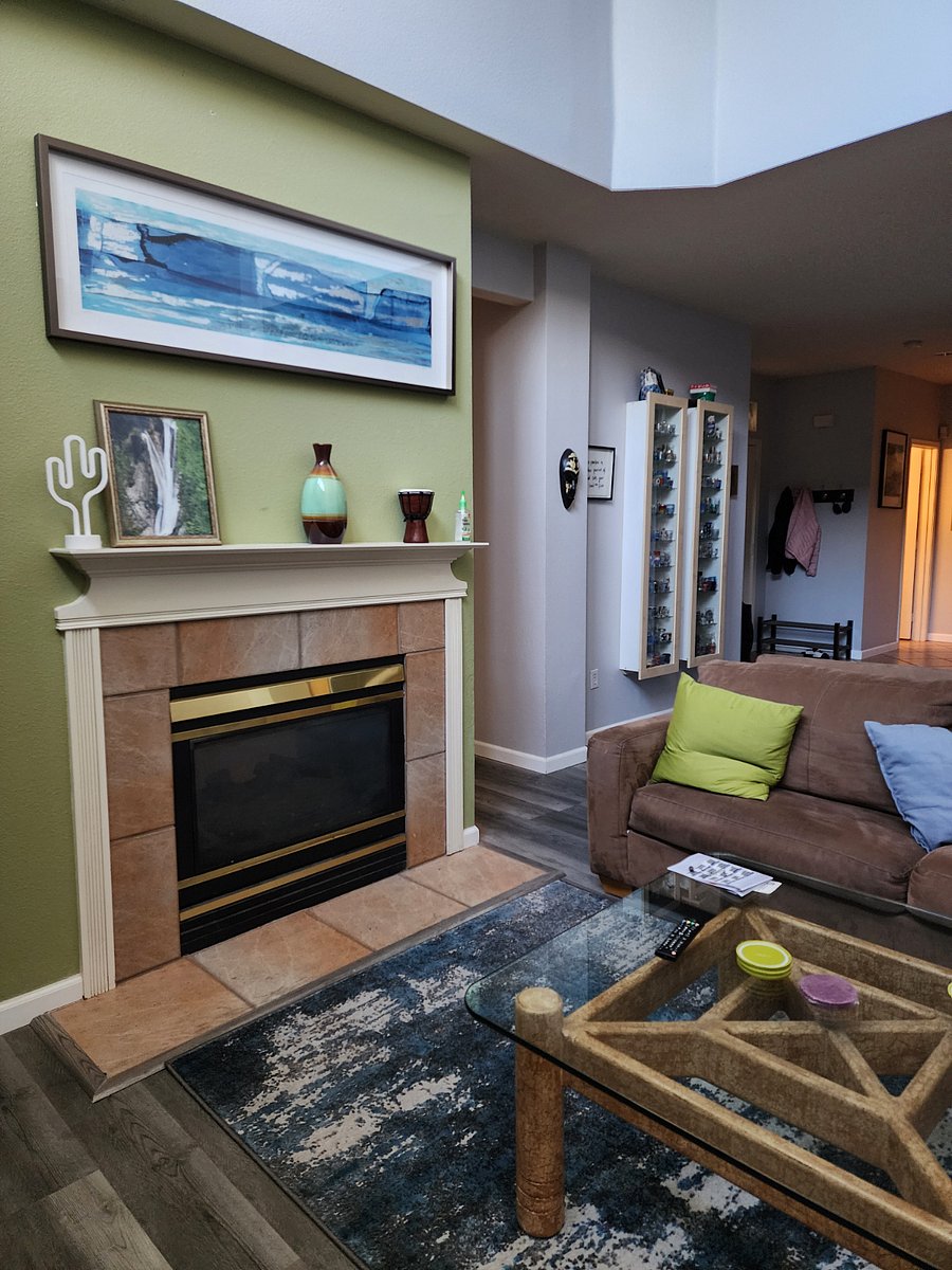 Lounge on the couch next to the dual, sided fireplace