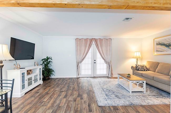 This well-appointed living room has everything you need to feel at home