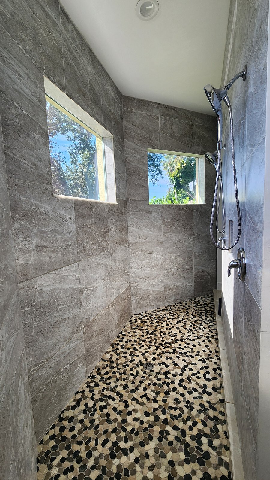 Master shower with 2 shower heads.