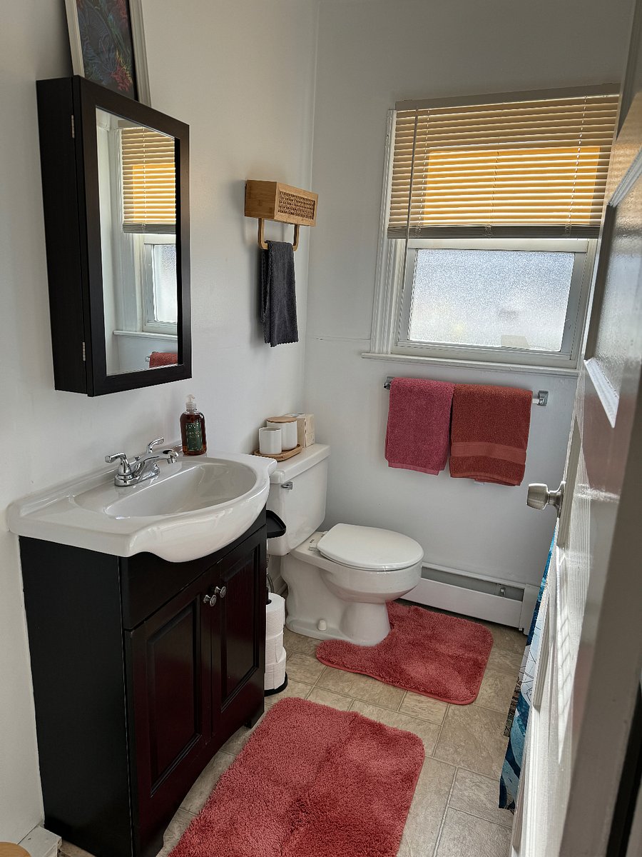 Full bathroom with tub and shower