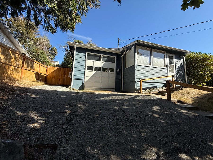 Note that the studio is the attached garage looking structure on the left side of the property. There is plenty of street parking in front of the property, slightly steep walkway up to the unit.