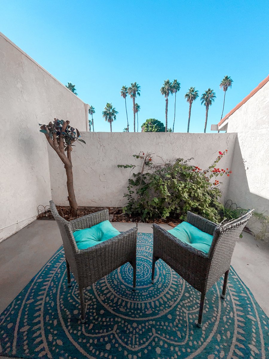 Primary bedroom private patio for sipping morning coffee or unwinding with a glass of wine.