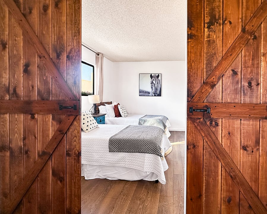 Beautiful rustic barn doors for added privacy.